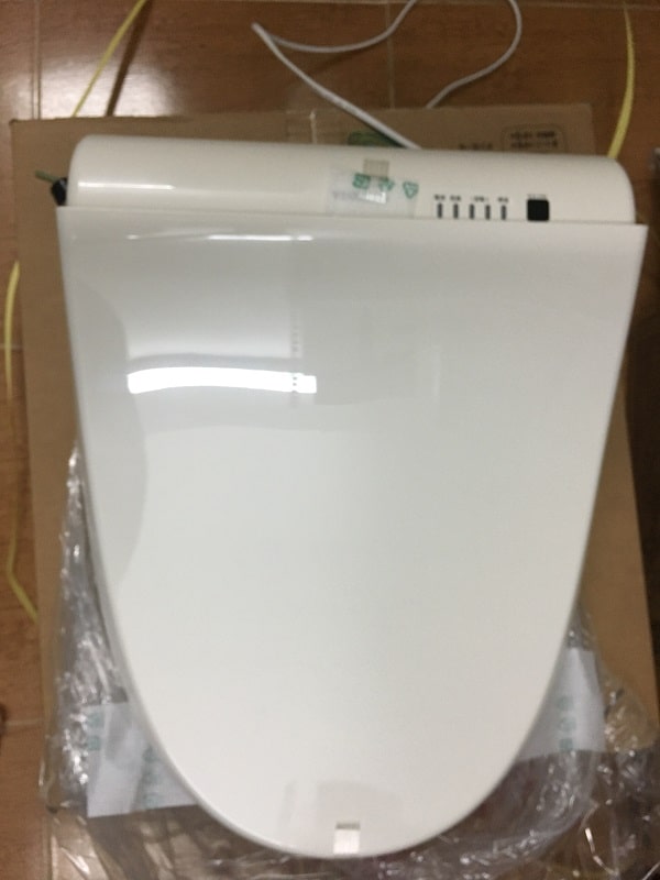Nắp bệt bồn cầu TOTO TCF6521 với bảng điều khiển từ xa